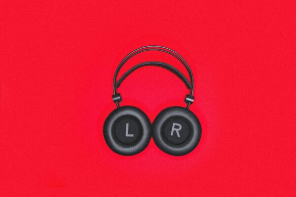 Headphones on a red background