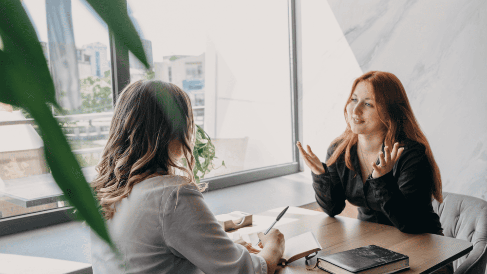 A coaching psychologist at work with her client